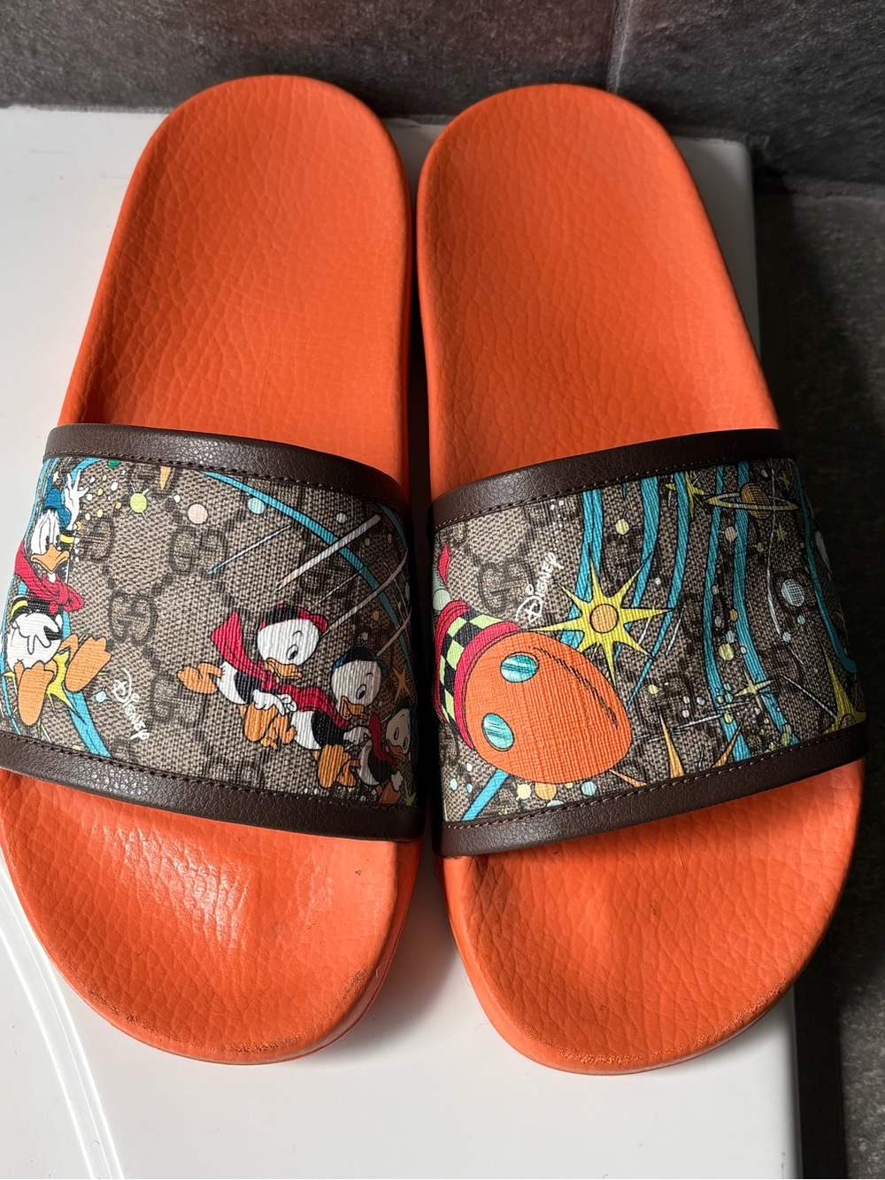 Gucci Orange & Brown Monogram Disney Graphic Slide Sandals